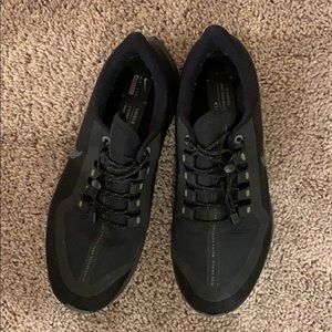 Pegasus Nike black running shoes